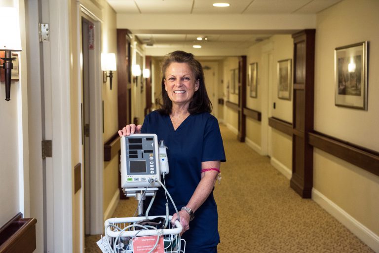 Nurse with equipment at Willow Valley Communities